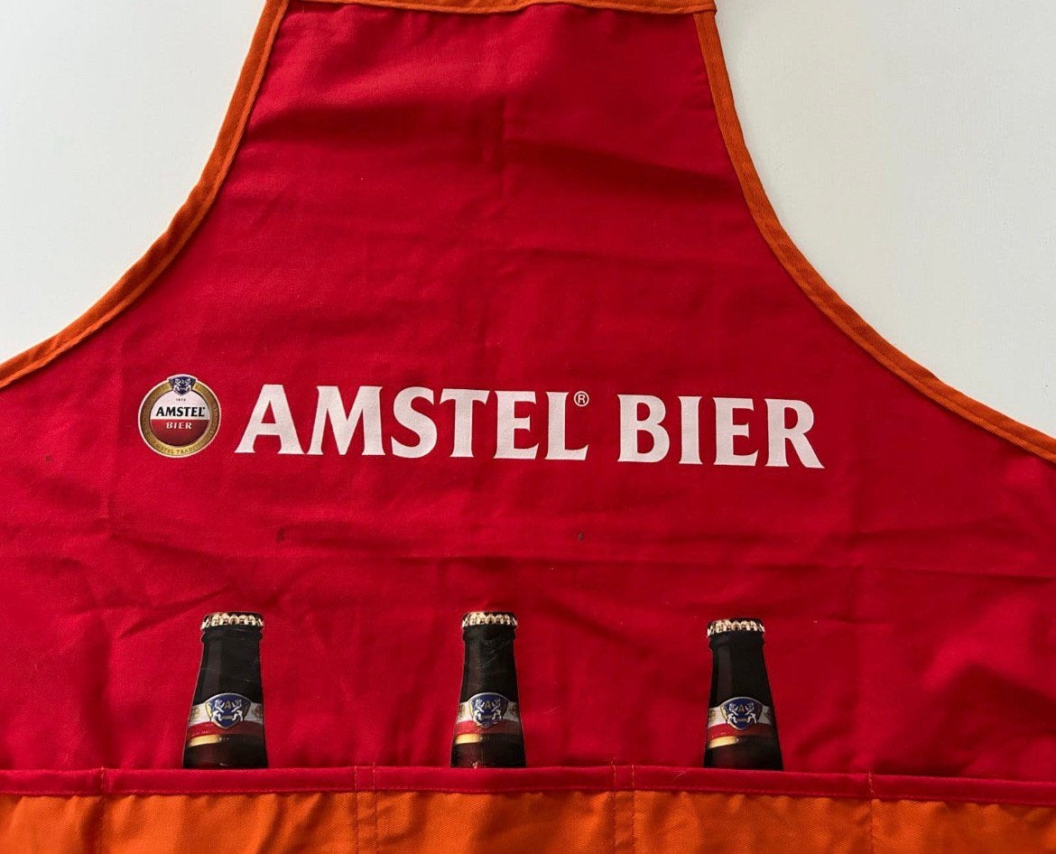 Amstel Bier schort Oranje met flesopener WK voetbal, Ophalen of Verzenden, Zo goed als nieuw, Kleding, Amstel