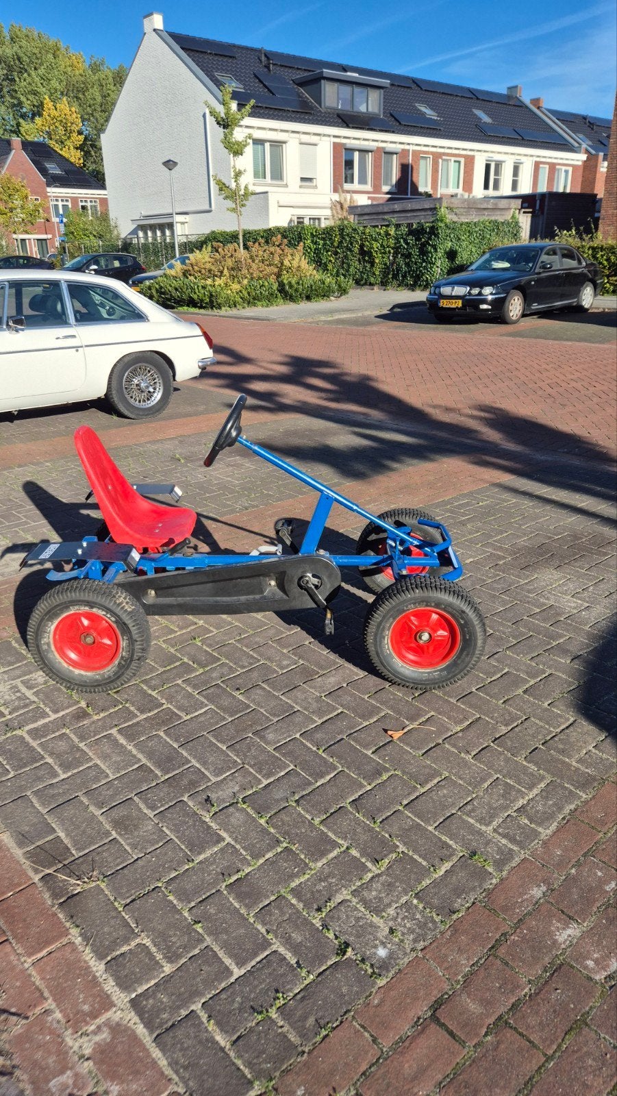 Berg skelter - Blauw met rood zitje