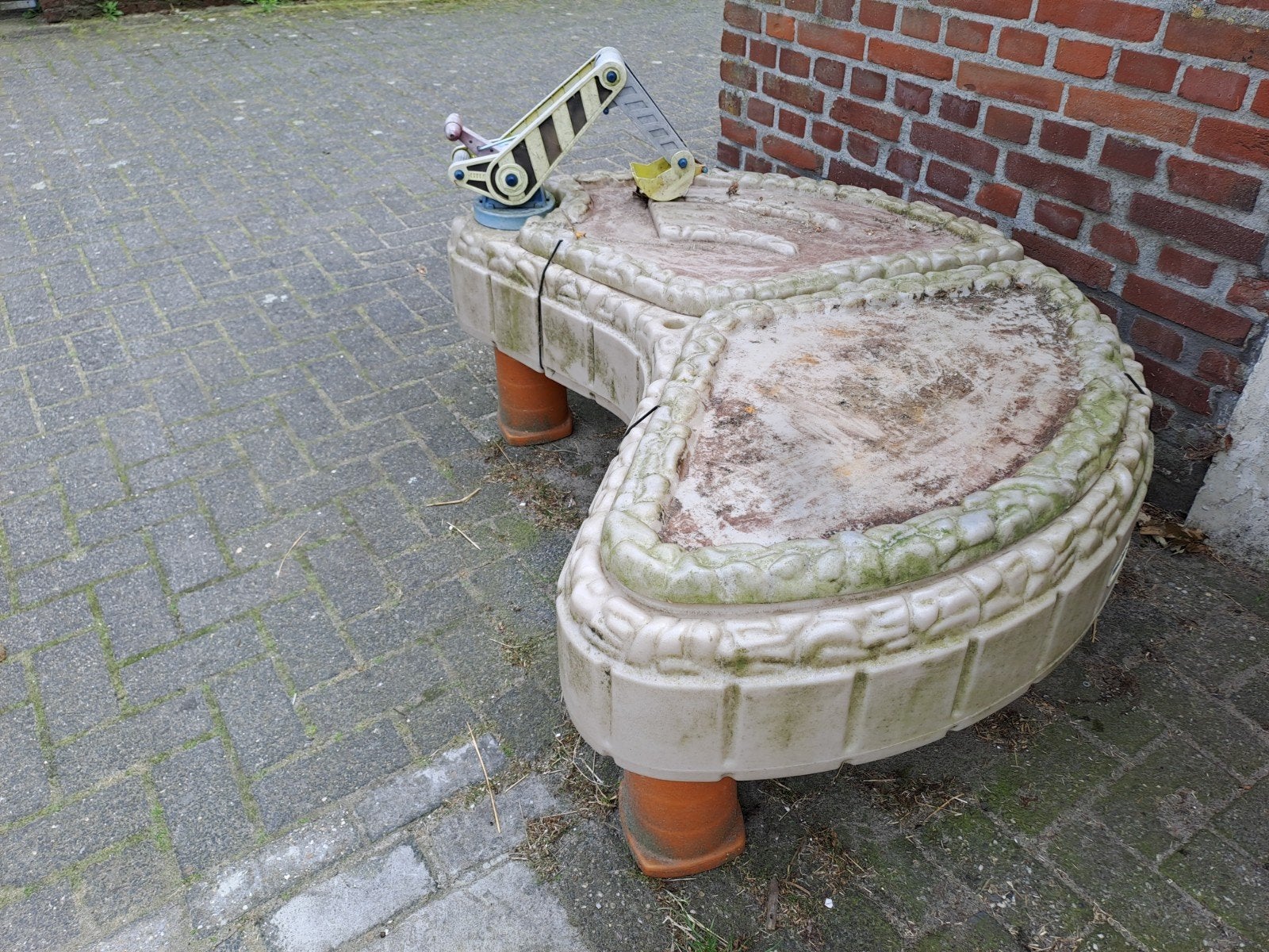 Little Tikes zand- en watertafel met graafmachine, Ophalen