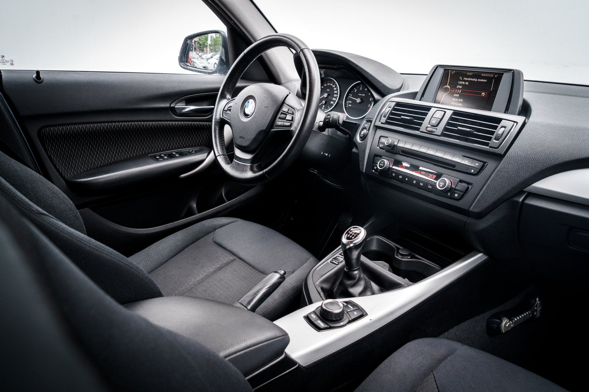 BMW 1-serie 116i Business | Airco | Xenon | Professional rad, Auto's, BMW, Euro 5, Gebruikt, 4 cilinders, Blauw
