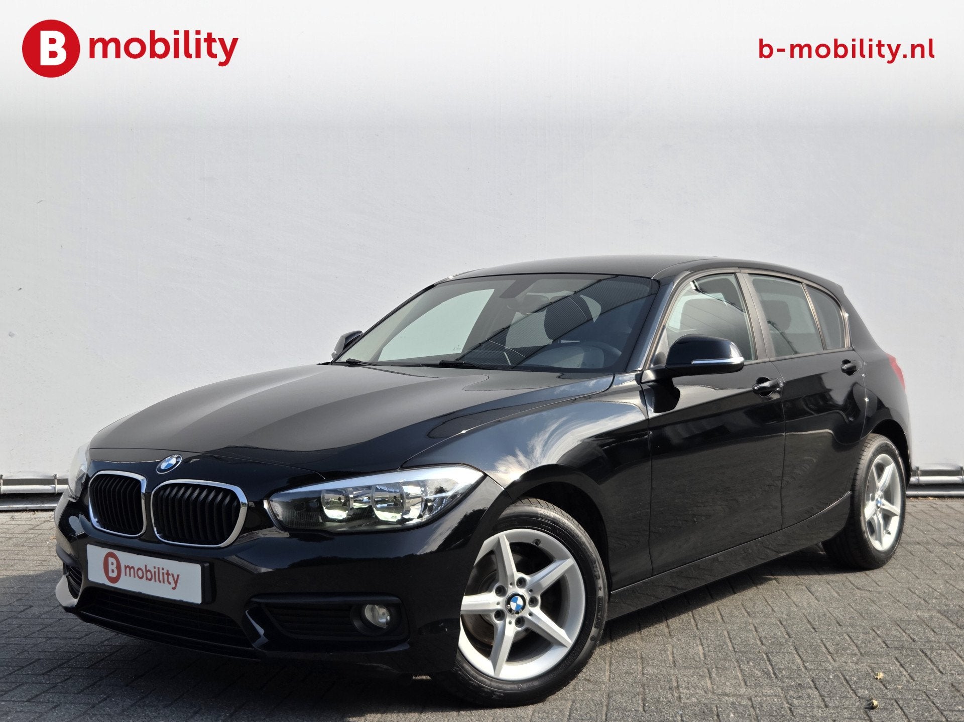 BMW 1-serie 116i Executive Sport-Line Stoelverwarming | Navi, Auto's, 1-Serie, Zwart, 3 cilinders, 1499 cc