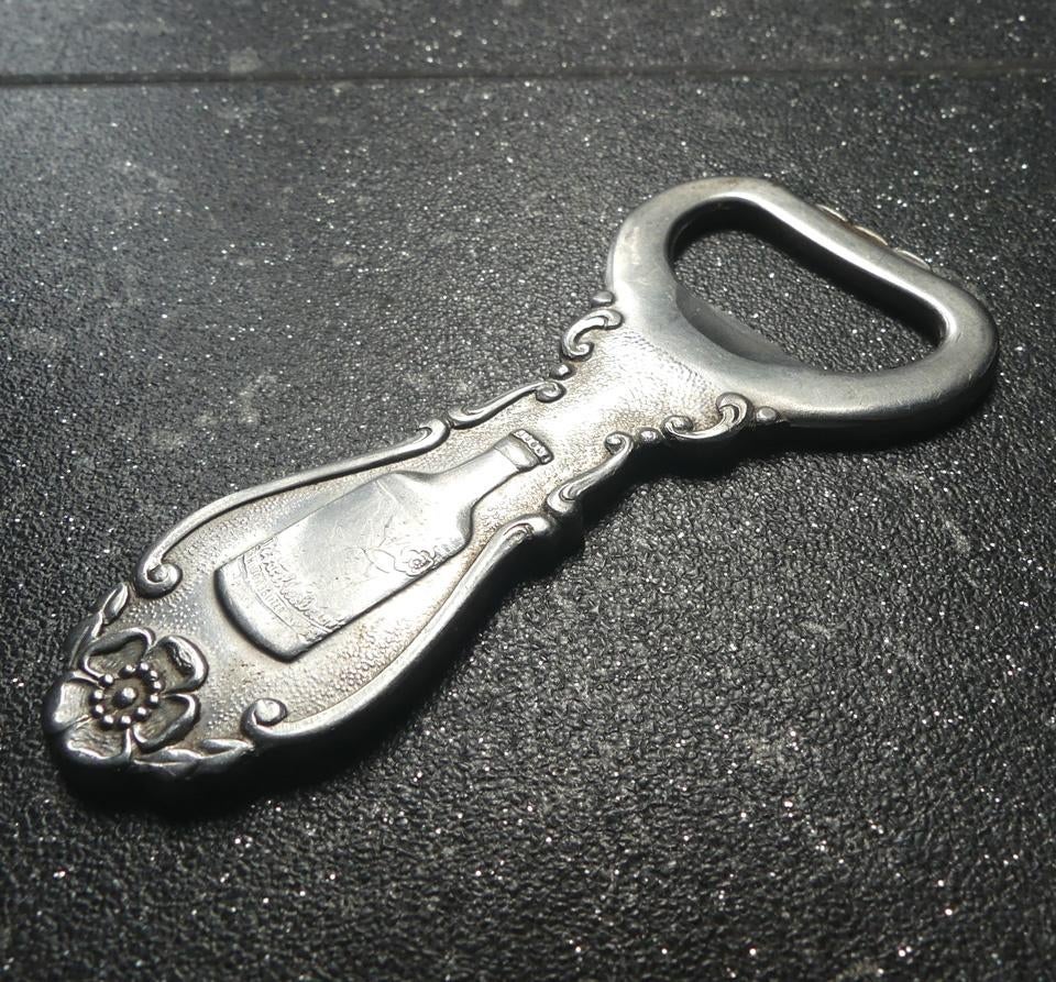 Sola flesopener "De parel der dranken", Ophalen of Verzenden, Gebruikt, Rvs of Chroom