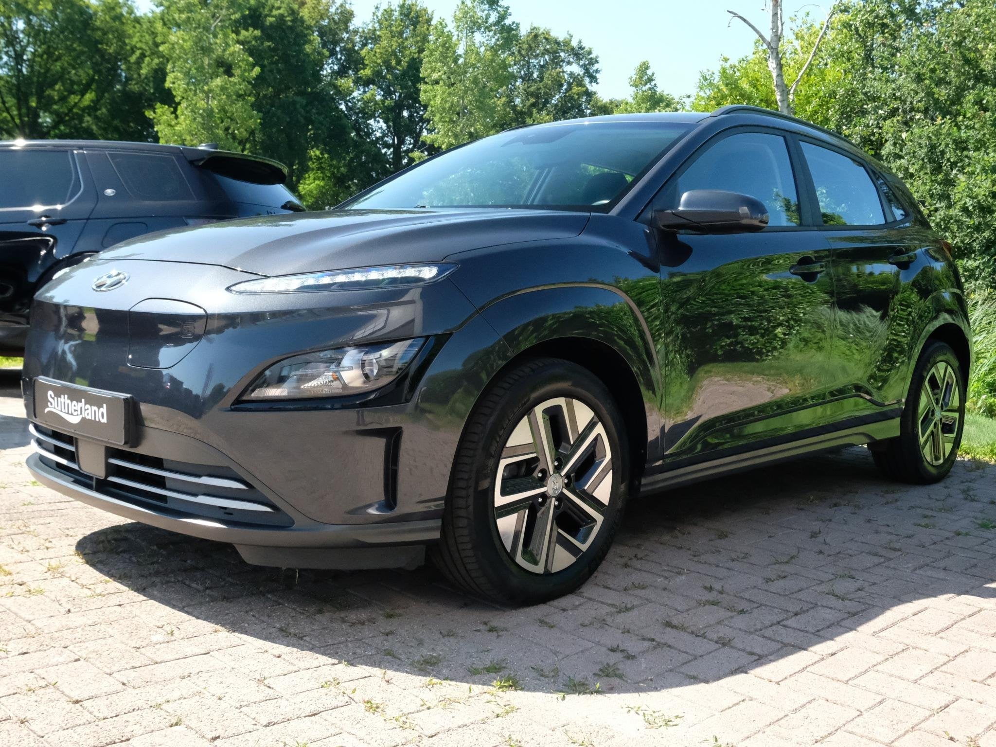 Hyundai Kona EV Fashion 64 kWh | 204 PK | SOH 95% | Adaptive, Auto's, Stof, Gebruikt, Overige kleuren, 204 pk