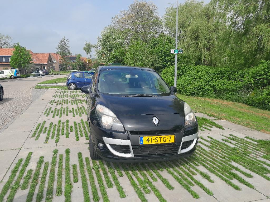 Renault Scénic 1.4 TCE 96KW 2011 Zwart,  82.400 km, Voorwielaandrijving, 4 cilinders, Leder en Stof, Zwart