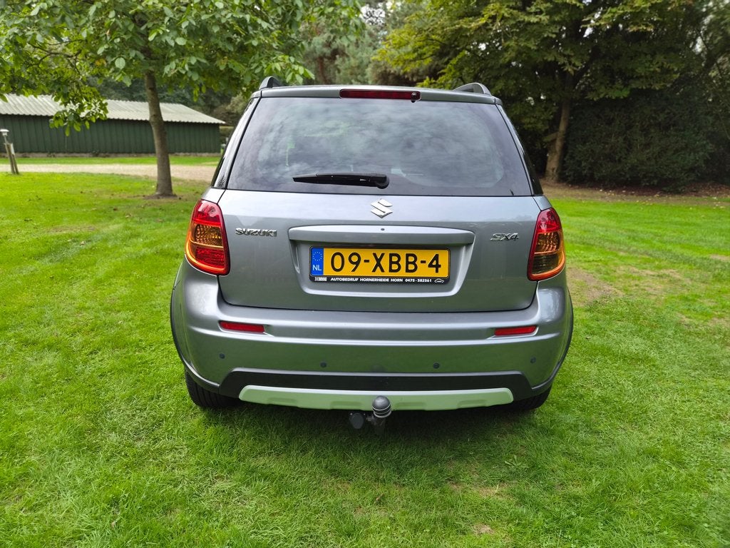 Suzuki SX4 1.6 AUT 2012 Grijs, Auto's, 4 cilinders, 49 €/maand, Origineel Nederlands, 1200 kg