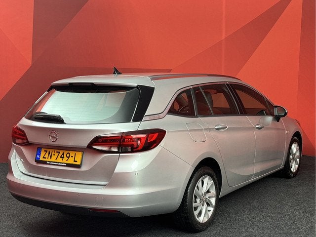Opel Astra Sports Tourer 1.4 Turbo Business Executive, Auto's, Opel, Gebruikt, 150 pk, Leder en Stof, Origineel Nederlands
