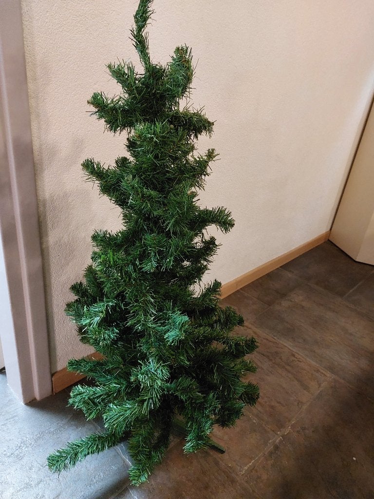 kunst kerst boom, Ophalen