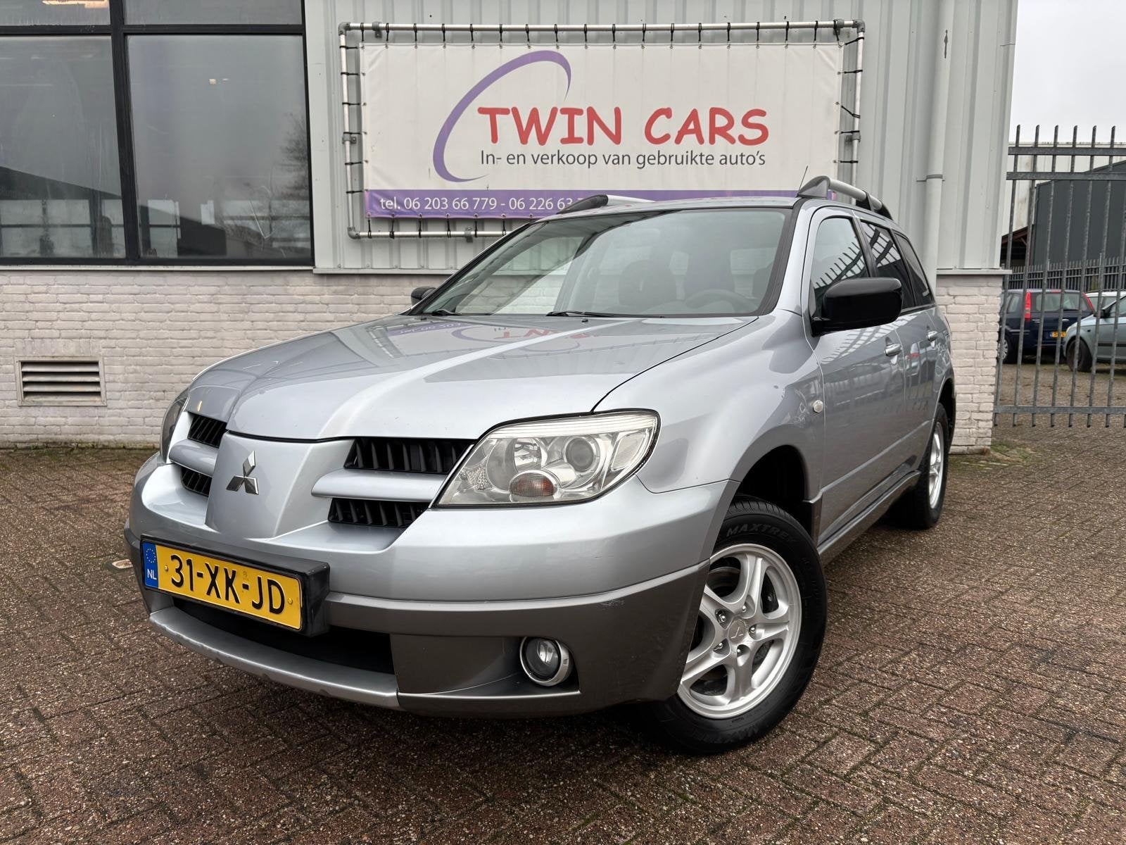 Mitsubishi Outlander Sport 2.0 Invite+ Airco LPG G3, Auto's, Mitsubishi, Voorwielaandrijving, Automatische klimaatregeling, 136 pk