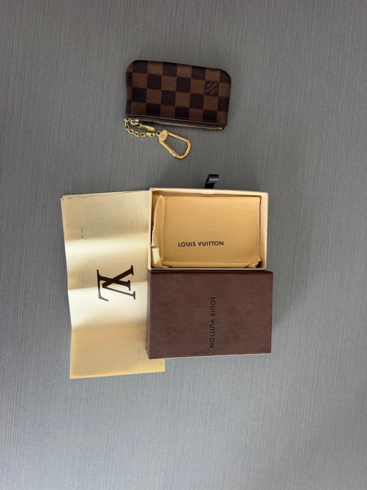 Louis Vuitton Sleuteletui Damier Ebene key pouch, Ophalen of Verzenden, Zo goed als nieuw, Bruin, Overige merken
