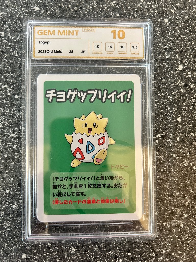 Pokemon Slab NXR Togepi, Ophalen of Verzenden, Zo goed als nieuw, Losse kaart
