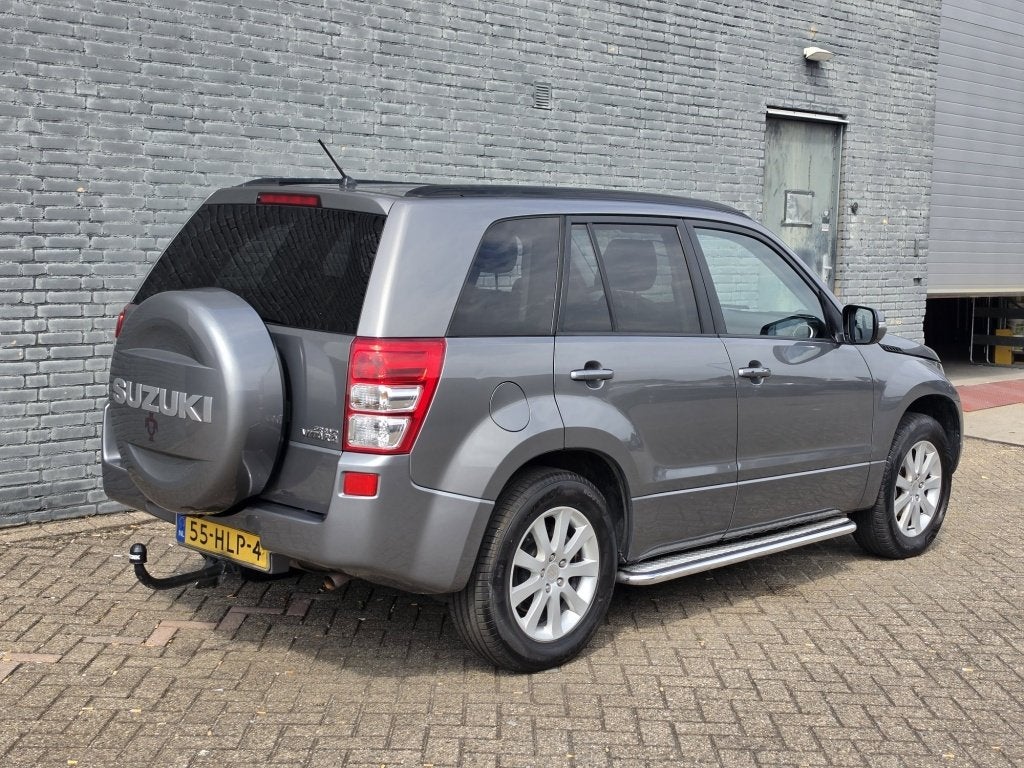 Suzuki Grand Vitara 2.0-16V Exclusive 4x4 Airco/Cruise ✅, Auto's, 4 cilinders, 1850 kg, Grand Vitara, Origineel Nederlands