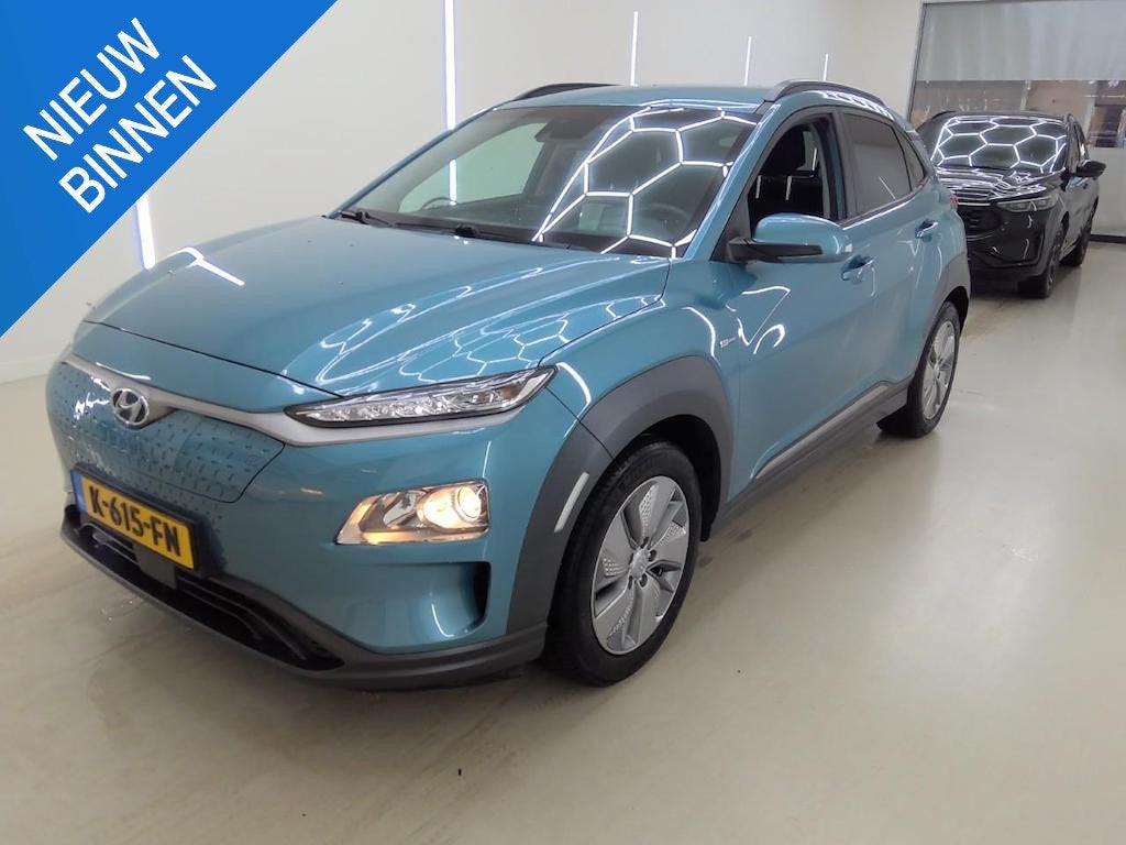 HYUNDAI KONA EV FASHION 64 kWh (100% SOH) I 3-FASE LADEN I T, Verwarmde buitenspiegels, Stof, Gebruikt, Huisgarantie