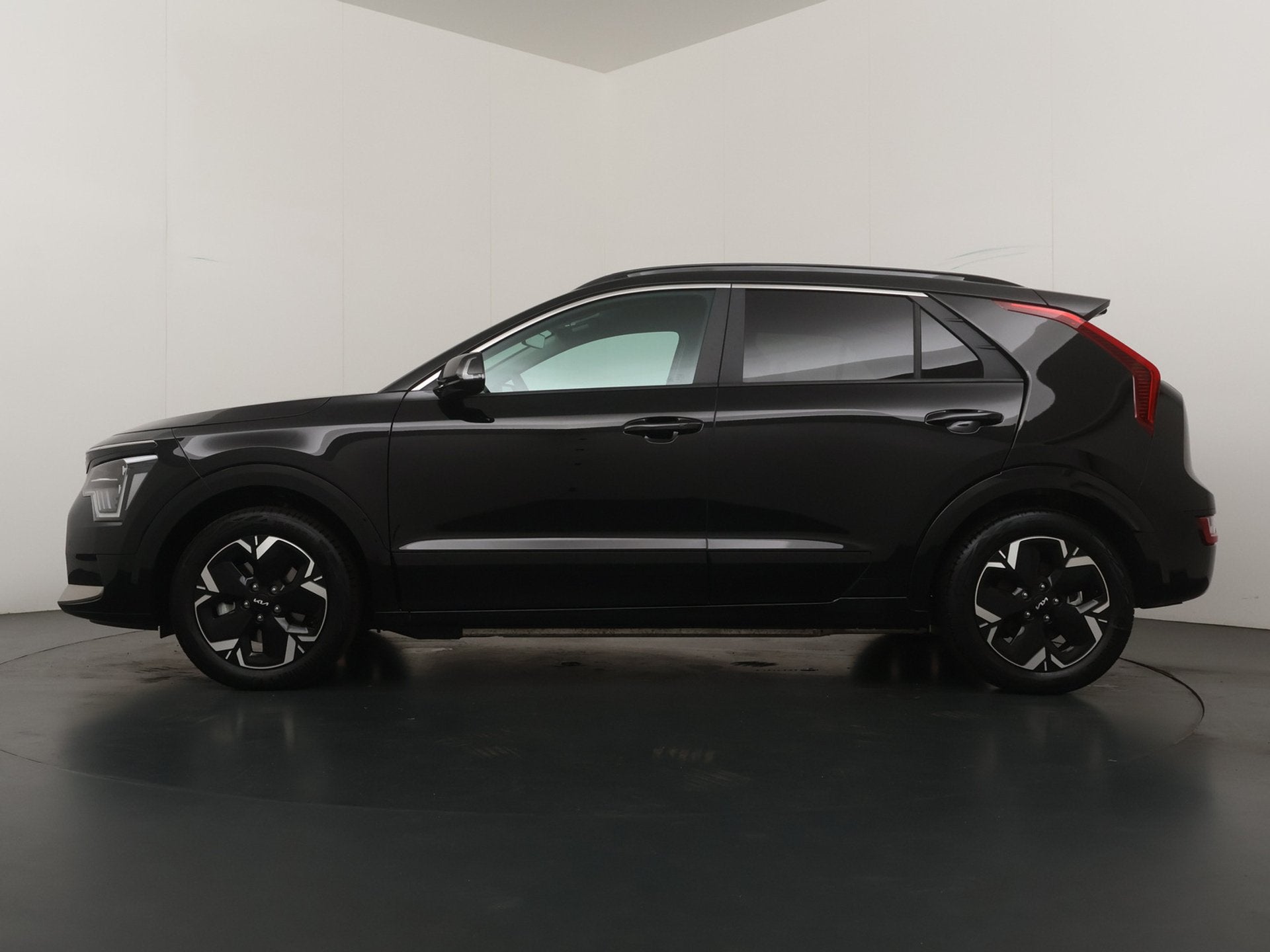 Kia Niro EV Air 64.8 kWh - Elektrische bestuurdersstoel - St, Auto's, Gebruikt, Met garantie (alle), 1657 kg, Zwart