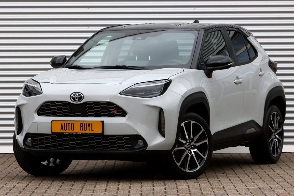 Toyota Yaris Cross 1.5 Hybrid GR Sport JBL / Head-up / Navi, Auto's, Gebruikt, Zwart, Automatische klimaatregeling, Bedrijf