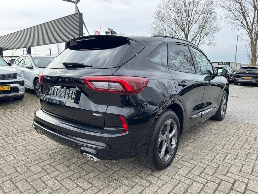 Ford Kuga 2.5 FHEV ST-Line 190pk | Winterpack | Achteruitrij, Stof, Gebruikt, 1589 kg, Zwart