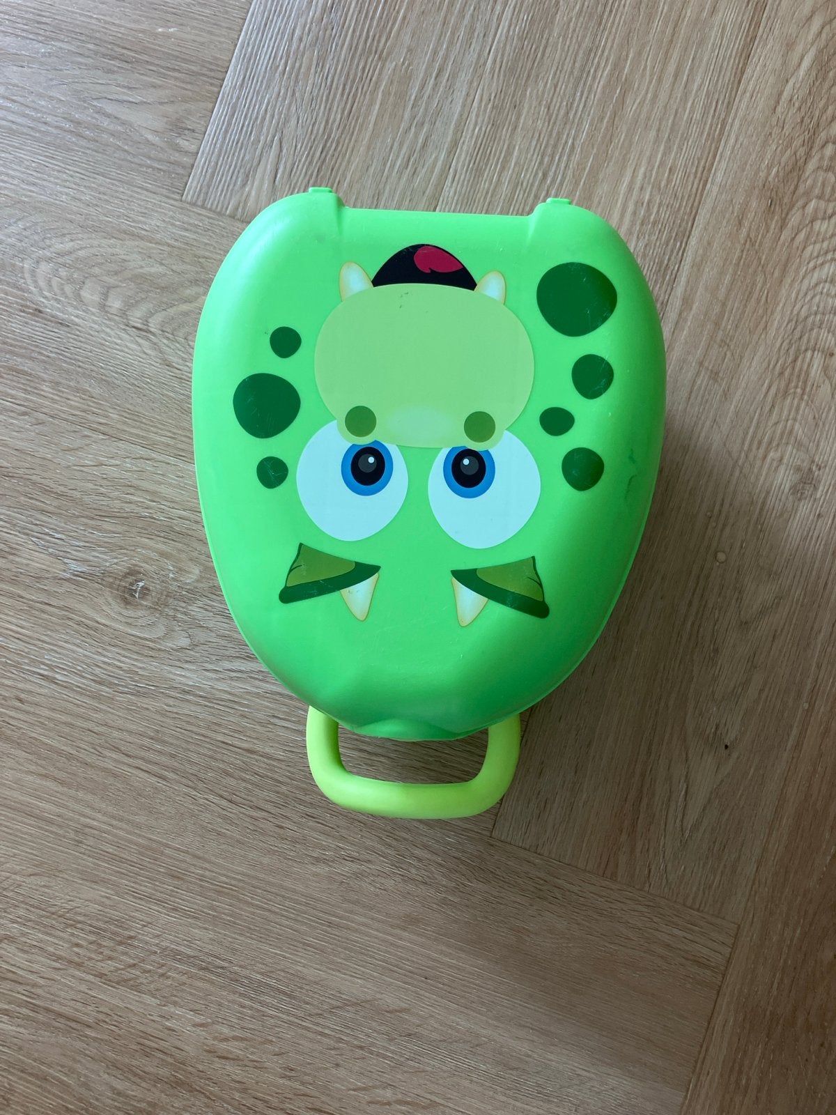 Draagbaar kinderpotje - Groene dinosaurus, Ophalen, Zo goed als nieuw