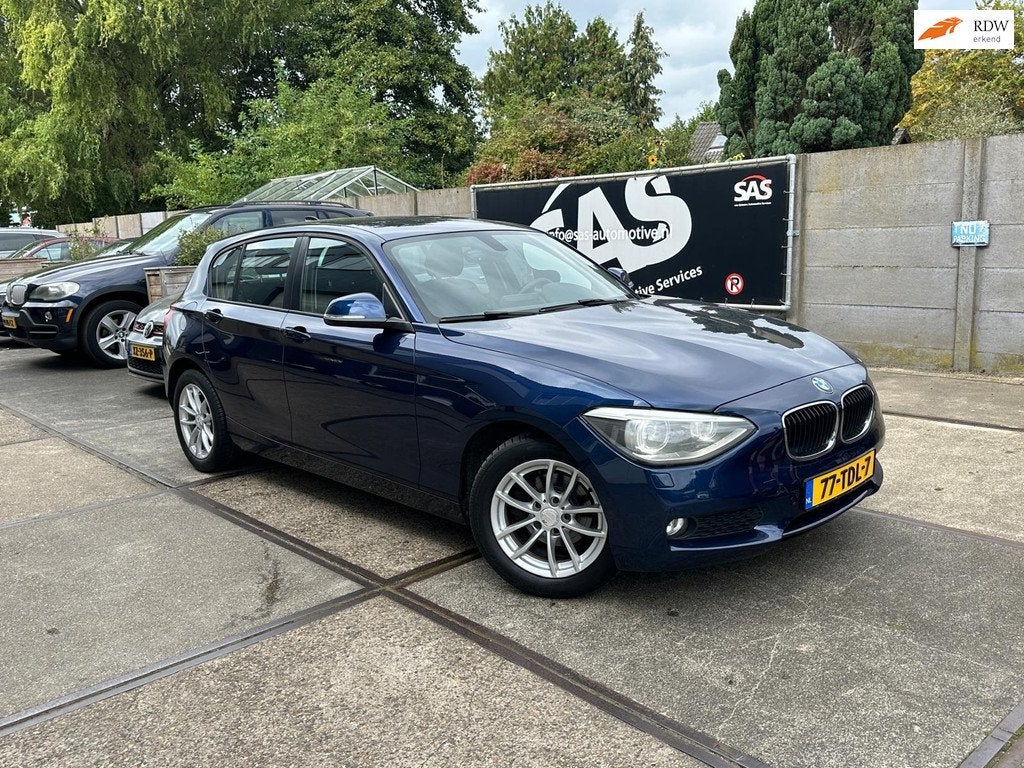 BMW 1-serie 116i Business+, Euro 5, Gebruikt, Zwart, 4 cilinders