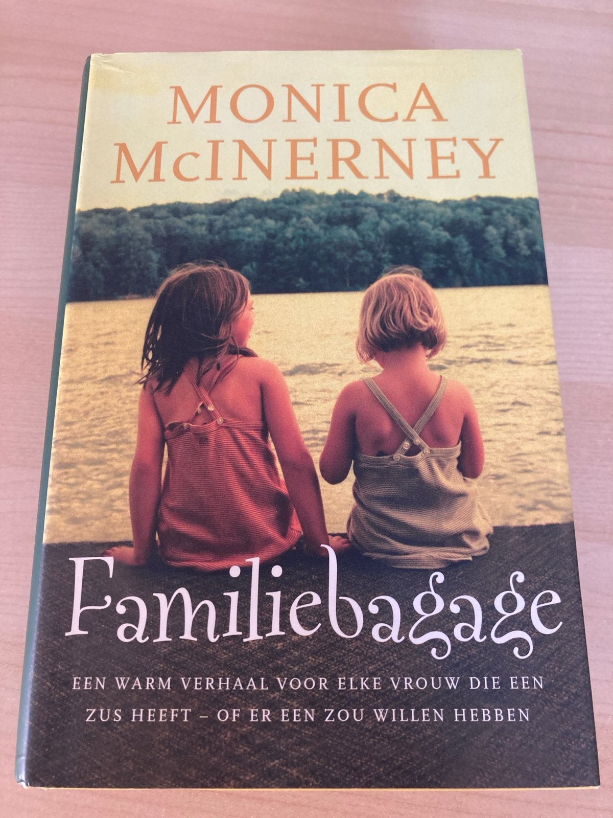 Familiebagage - Monica McInerney (Boek), Ophalen of Verzenden, Zo goed als nieuw, Nederland