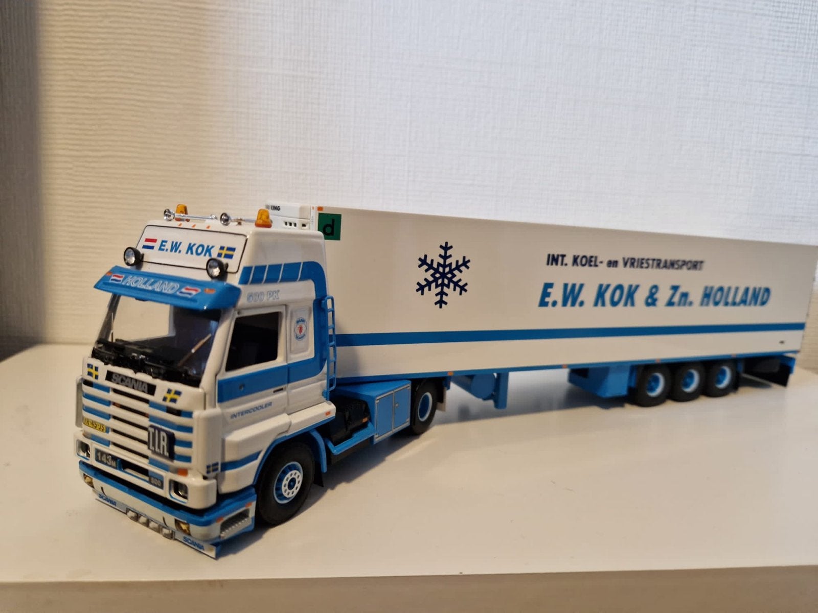 Tekno Scania 143 E.W. Kok & Zn. Holland, Hobby en Vrije tijd, Modelauto's | 1:50, Ophalen, Zo goed als nieuw, Bus of Vrachtwagen