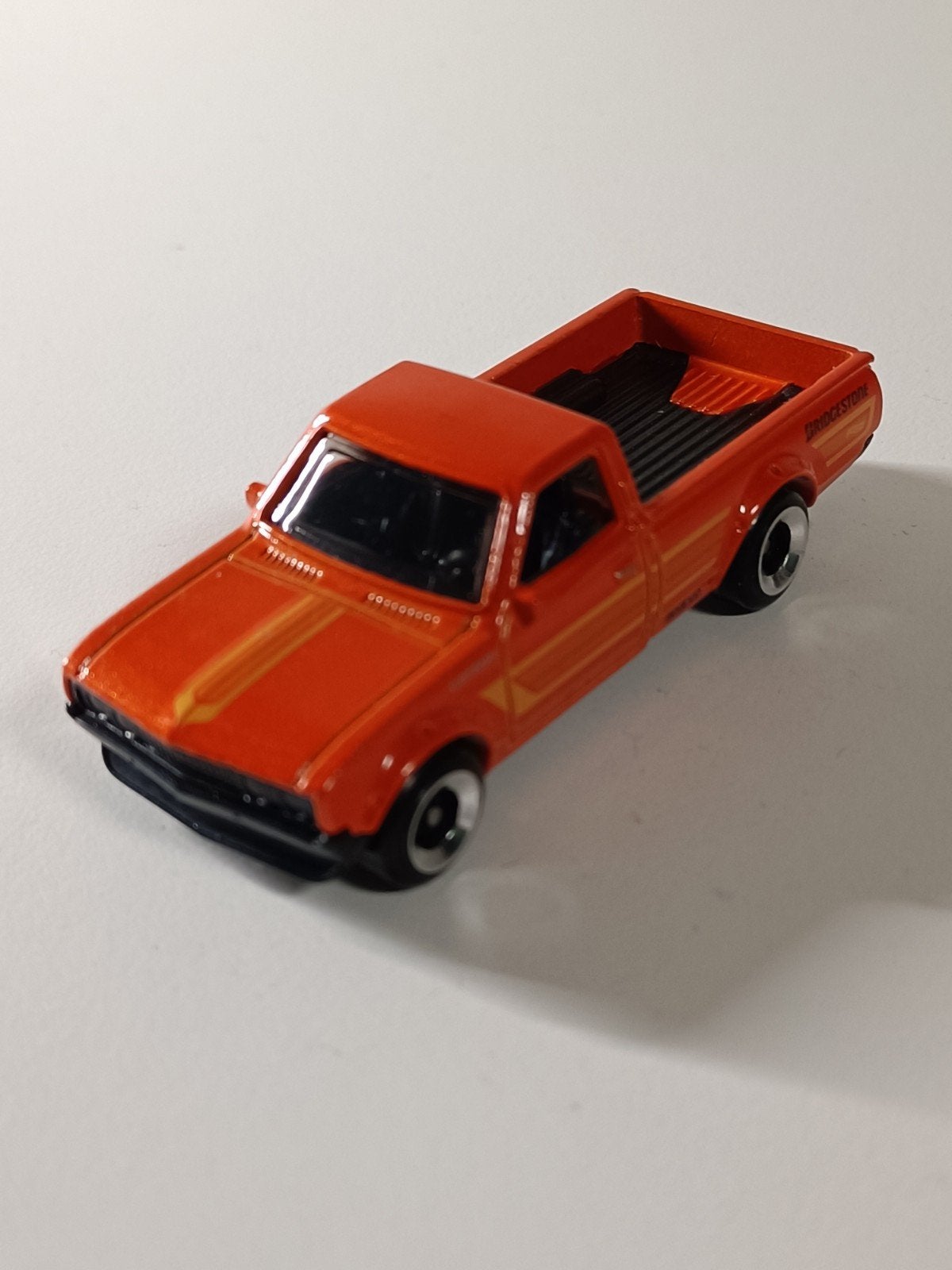 Hot Wheels Datsun 620 Pickup Oranje, Ophalen of Verzenden, Zo goed als nieuw