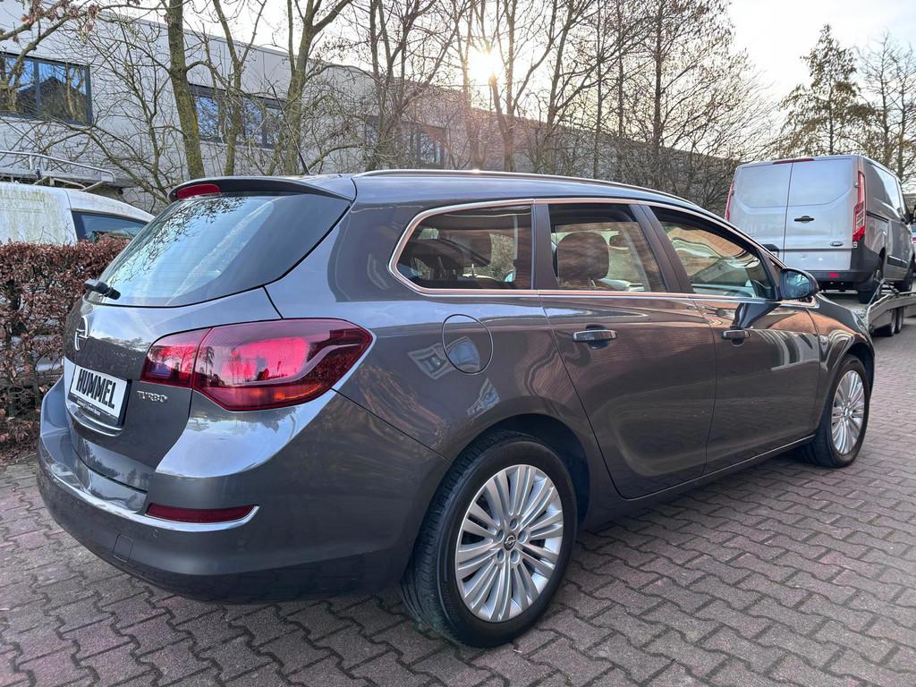 Opel Astra Sports Tourer 1.4 Turbo Cosmo, Auto's, Opel, Voorwielaandrijving, Gebruikt, Zwart, 4 cilinders