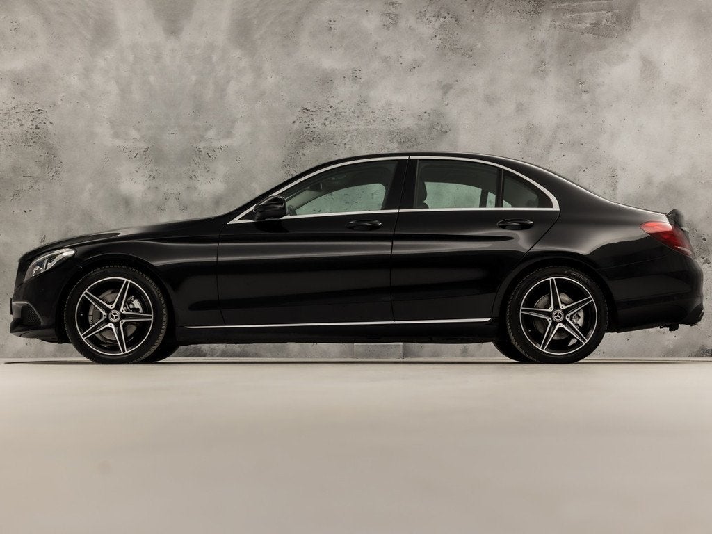 Mercedes-Benz C-Klasse 200 Sport 184Pk Automaat (GROOT NAVI,, Auto's, Automaat, 12 maanden, 4 cilinders, Leder en Stof