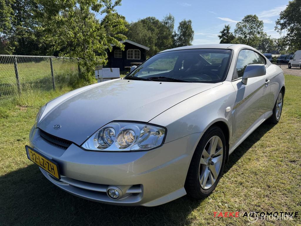 Hyundai Coupé 2.0i FX CVVT Clima/Cruise/1eEIG, Auto's, Hyundai, Stof, Gebruikt, Origineel Nederlands, Bedrijf