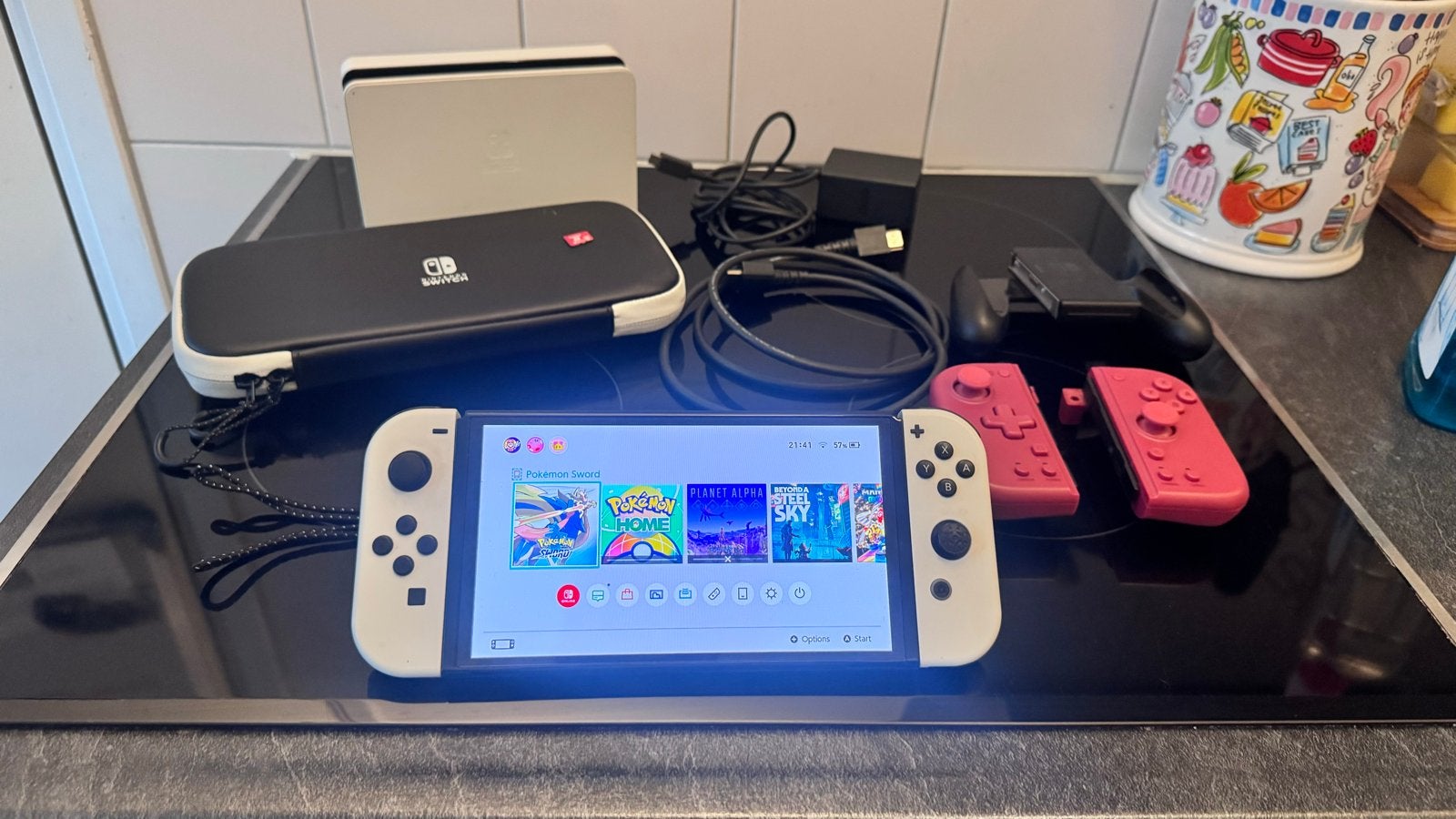 Switch OLED Wit Compl.+ 128GB SD + 2 Extra Nori Joy-Cons, Met games, Met 2 controllers, Zo goed als nieuw, Switch OLED