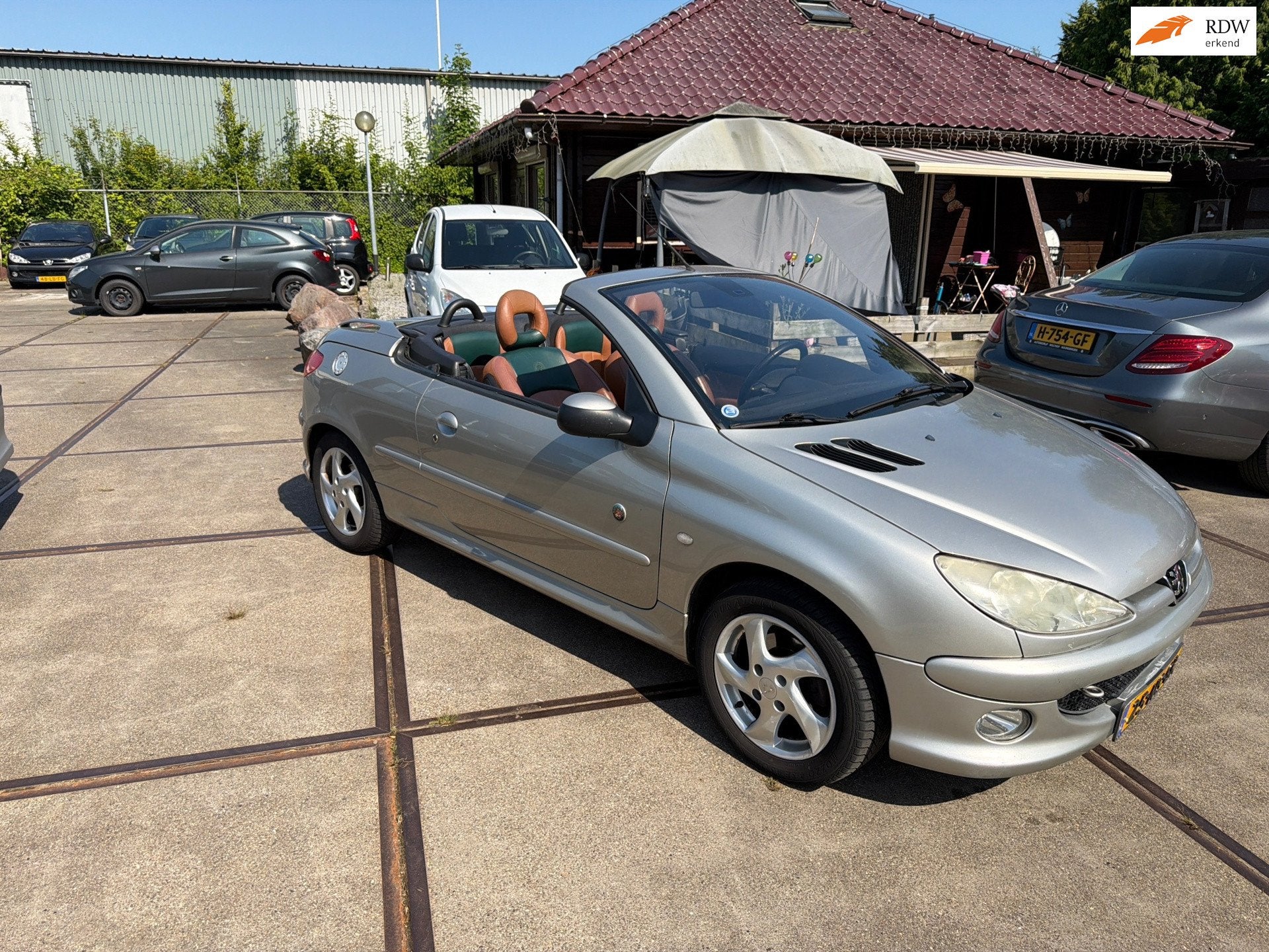 Peugeot 206 CC 1.6-16V Roland Garros Inruil mogelijk, Auto's, Peugeot, Voorwielaandrijving, Gebruikt, 4 cilinders, Cabriolet