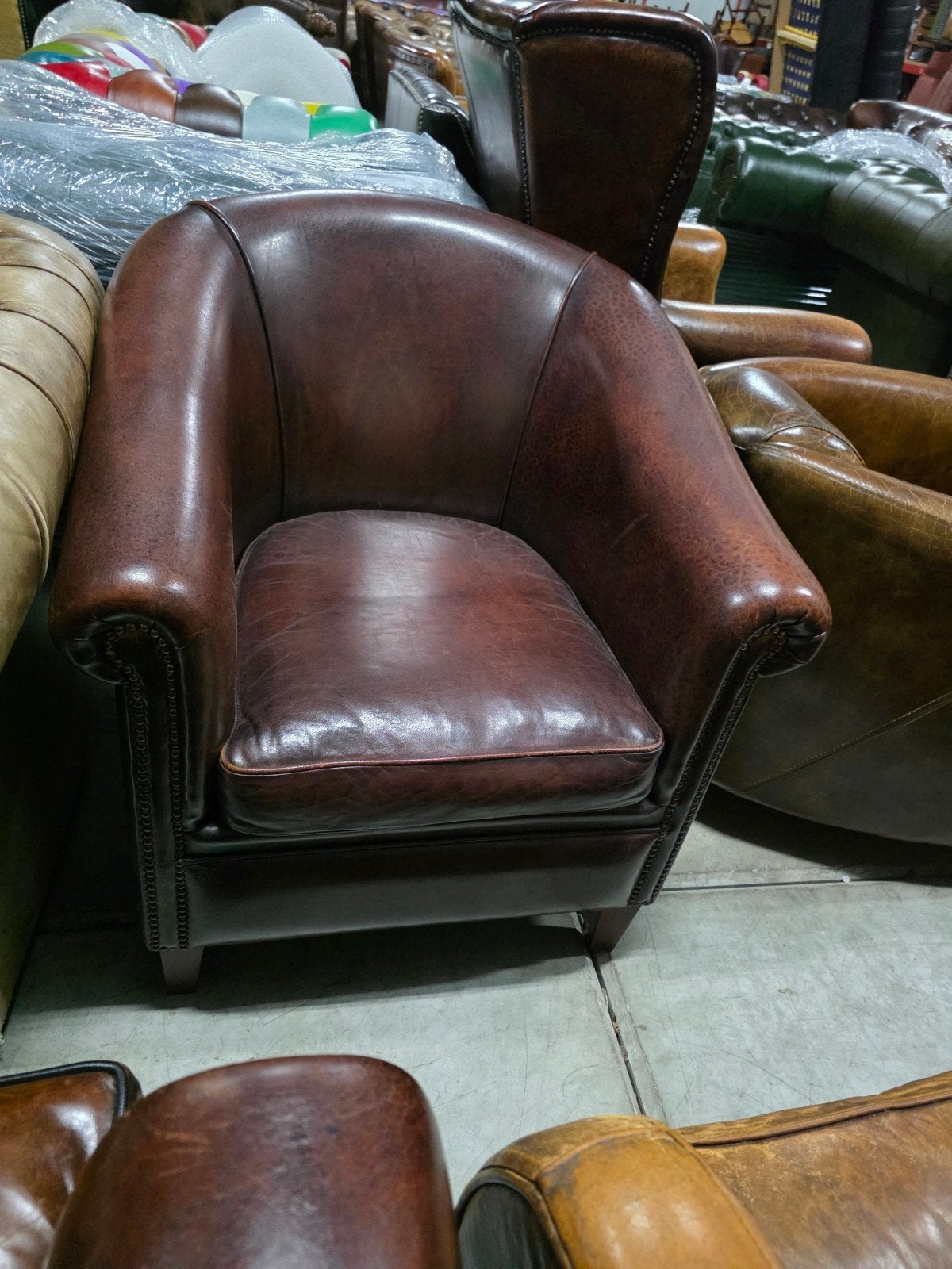 Schapenleren club fauteuil bruin rood + BEZORGING GRATIS
