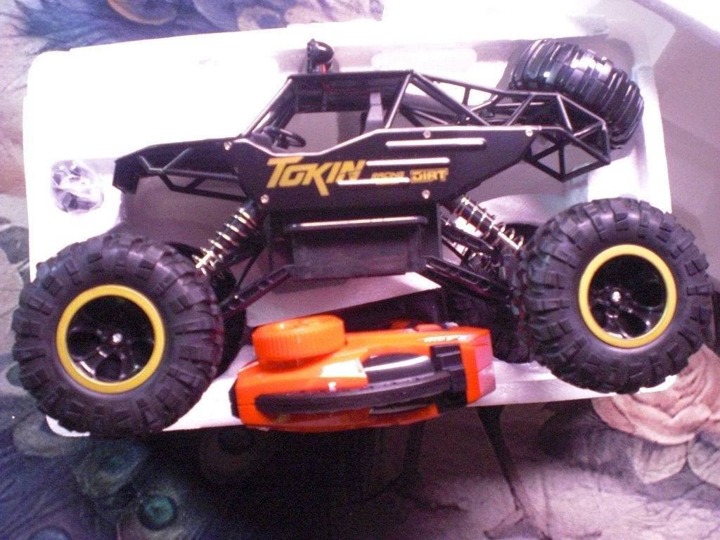 Afstand bestuurbare Monstertruck 1:12 - Gratis thuis in NL -, Hobby en Vrije tijd, Elektro, Auto offroad, Nieuw, Ophalen of Verzenden