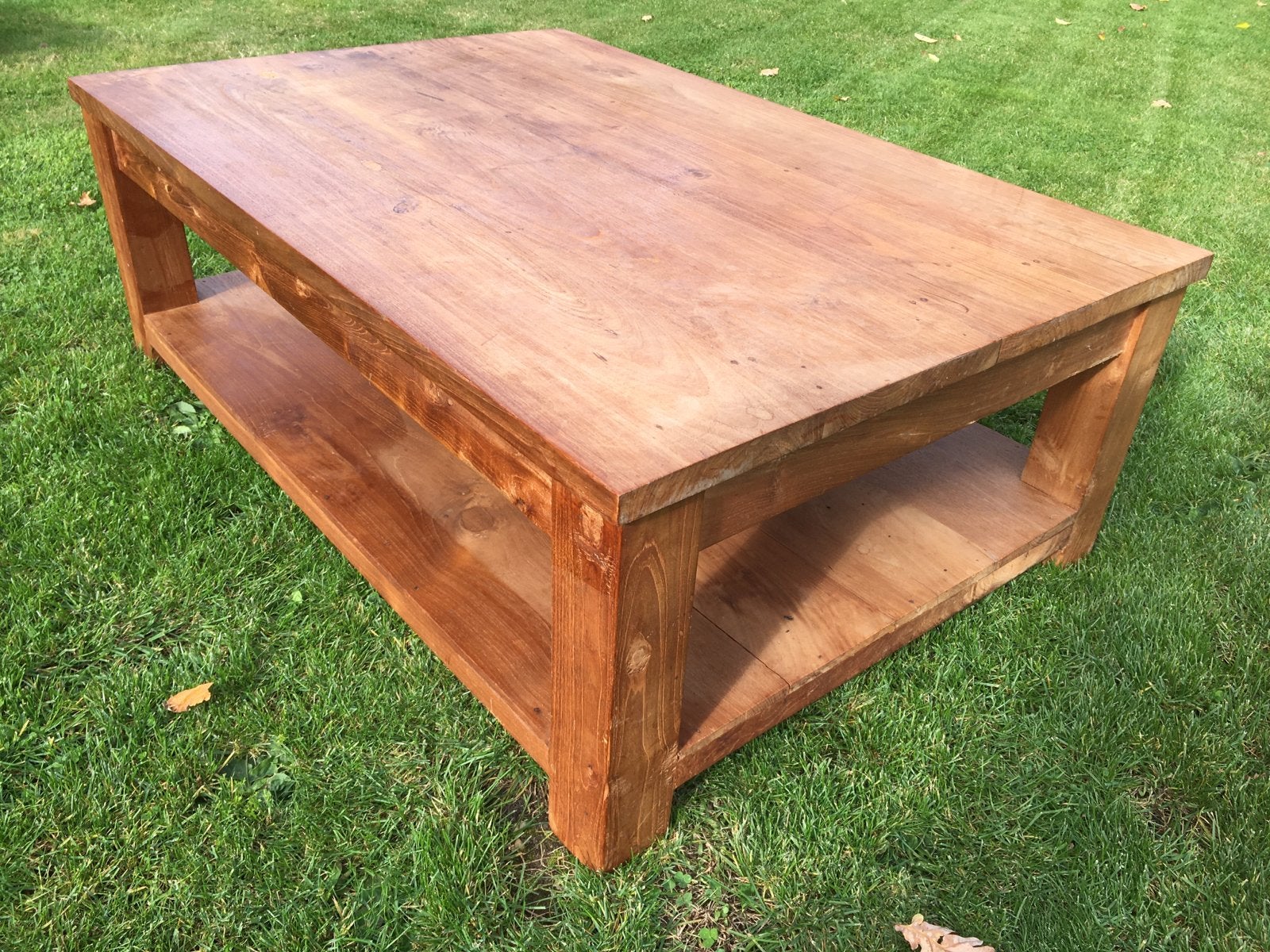Robuuste teakhouten salontafel met opbergplank, Ophalen, Gebruikt, 100 tot 150 cm, 50 tot 100 cm