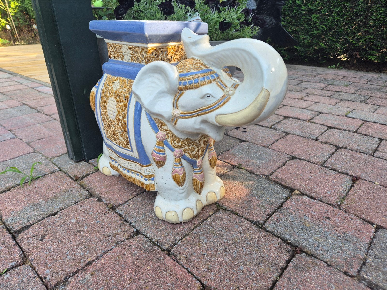 Decoratieve olifant plantenstandaard, Ophalen
