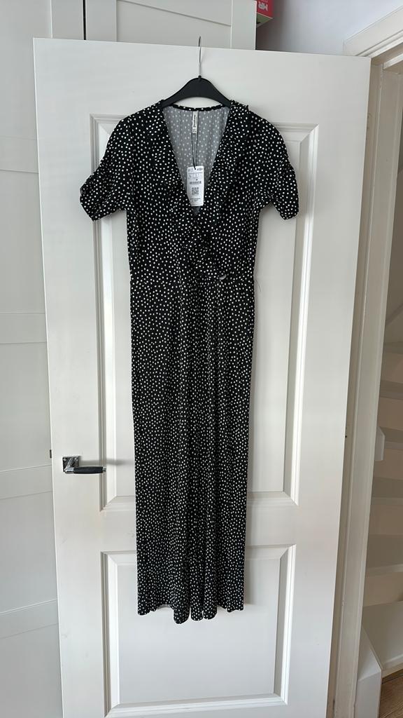 Nieuwe polkadot jumpsuit Stradivarius L, Kleding | Dames, Jumpsuits, Ophalen of Verzenden, Nieuw, Zwart