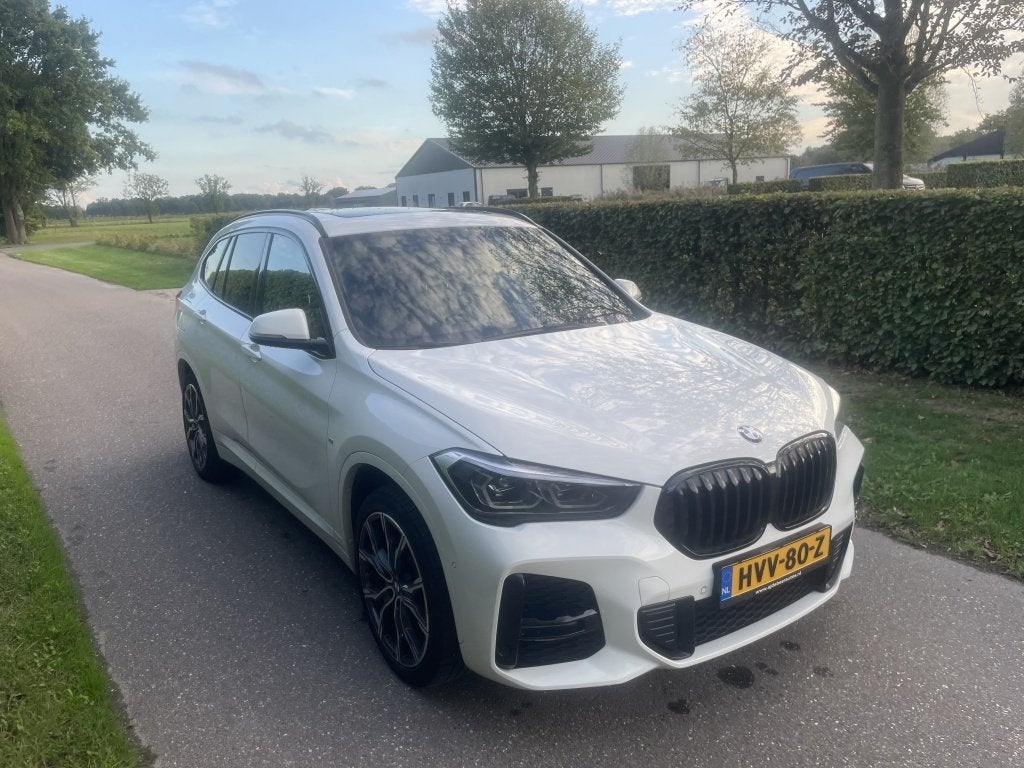 BMW X1 xDrive25e High Exec. (bj 2021, automaat), Auto's, 125 pk, Gebruikt, Wit, Leder