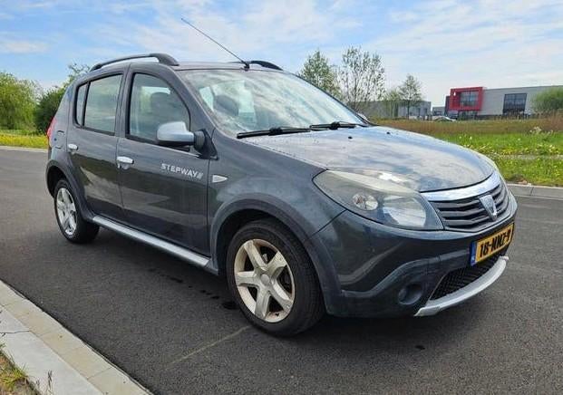 Dacia Sandero Stepway 1.6 CRUISE CONTROL 2011 NAP Grijs, Auto's, Stof, 40 €/maand, 4 cilinders, 1070 kg