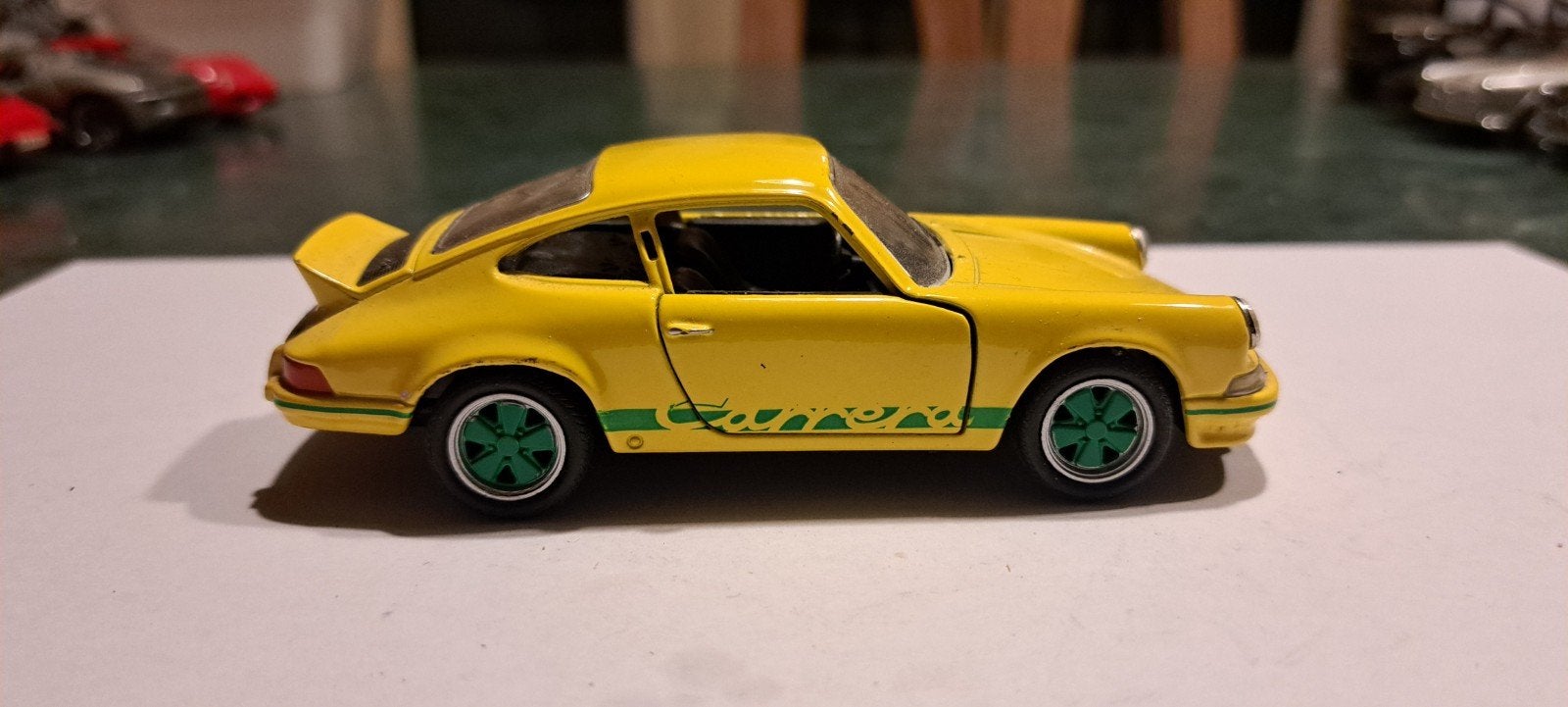 porsche 911 carrera rs 1973 1:36!!, Ophalen of Verzenden, Auto, Overige merken