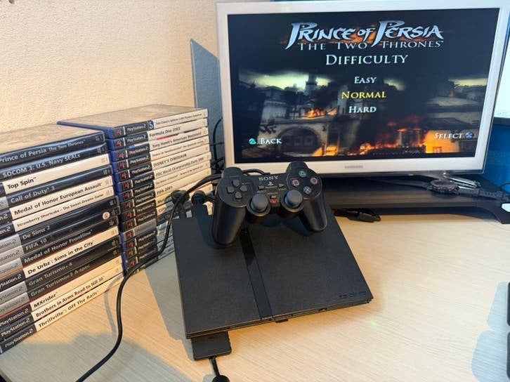 Playstation 2 compleet met 30 spellen, Spelcomputers en Games, Spelcomputers | Sony PlayStation 2, Met games, Zwart, Ophalen of Verzenden