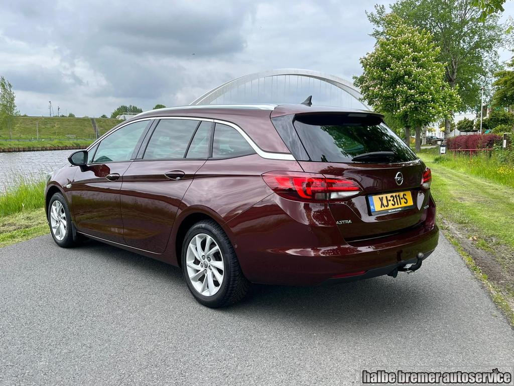 Opel Astra Sports Tourer 1.4 Executive|Trekhaak|Camera|Clima, Auto's, Voorwielaandrijving, Parkeersensor, Gebruikt, 4 cilinders