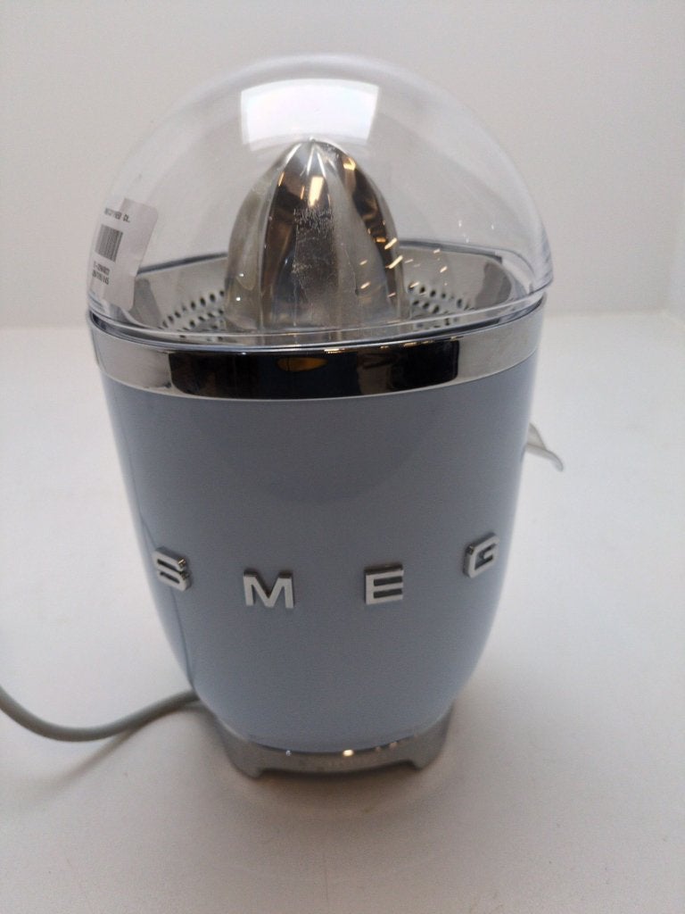 SMEG citruspers CJF11PBEU pastelblauw - retourdeal, Witgoed en Apparatuur, Citruspers, Nieuw, Bruggestraat 18, Elektrisch