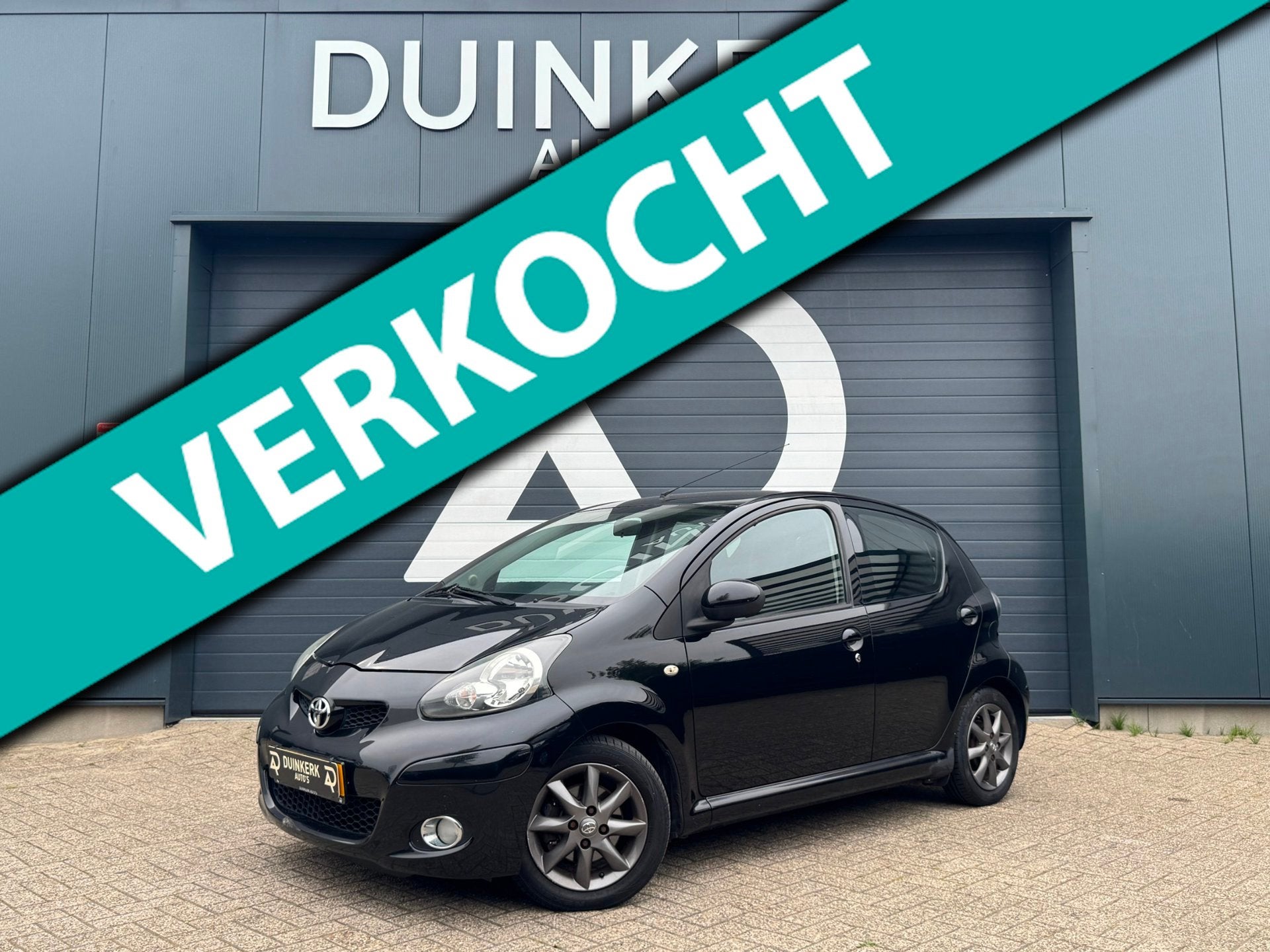 Toyota Aygo 1.0-12V Dynamic Navigator | Airco | Elektrische, Auto's, Voorwielaandrijving, Gebruikt, Zwart, 4 stoelen
