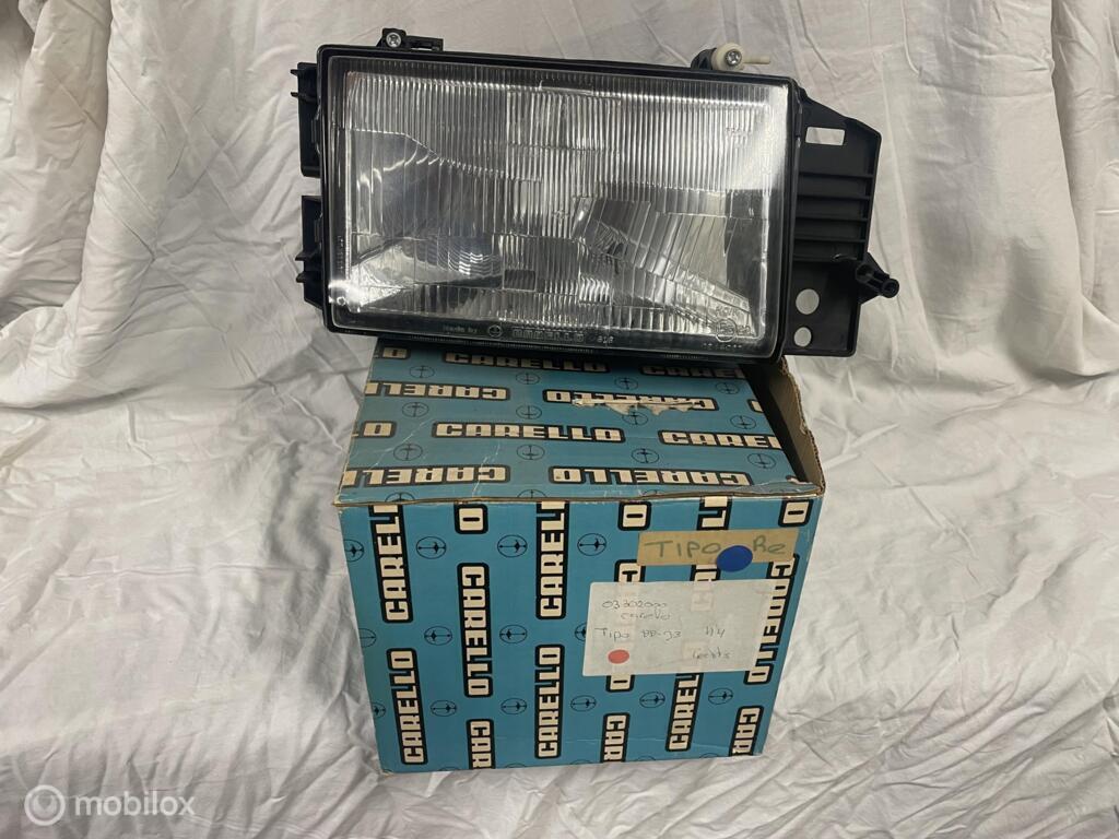 Koplamp origineel rechts Fiat Tipo 88-93 Carello 03302000, Auto-onderdelen, Verlichting, Nieuw, Ophalen of Verzenden