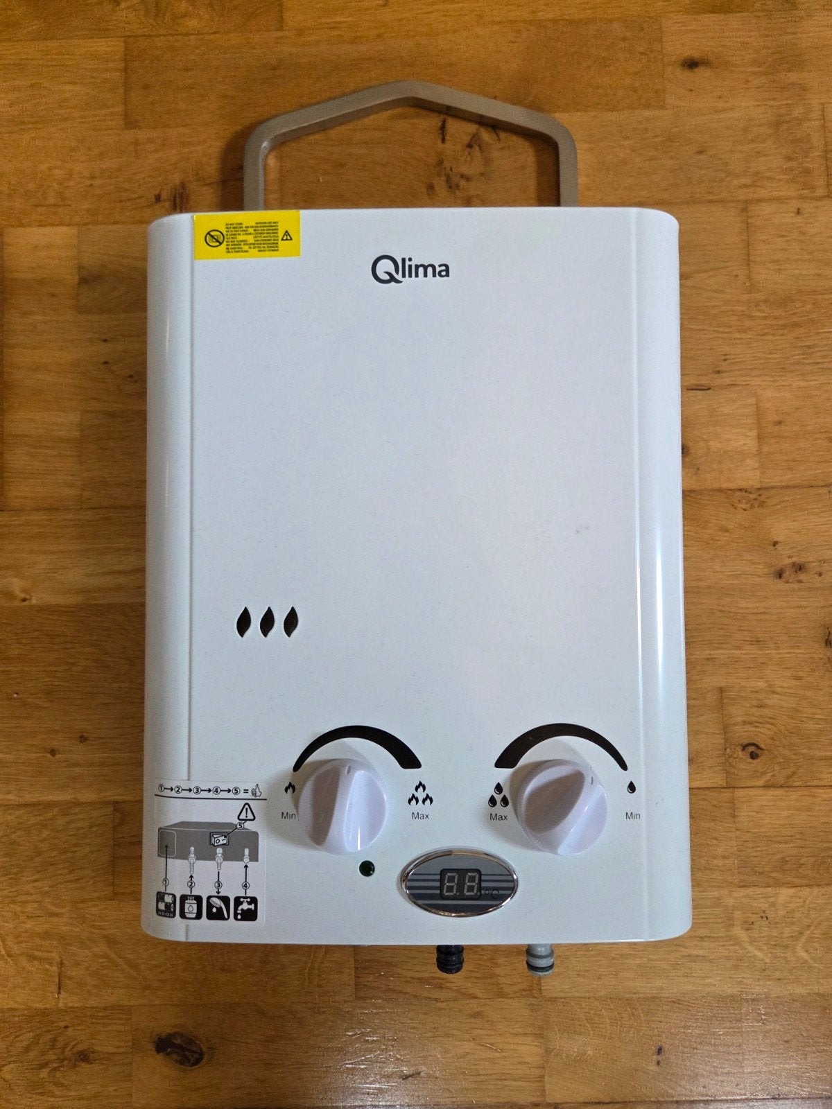 Qlima PGWH mobiele geiser - Slechts 2 weken gebruikt, Geiser, Ophalen of Verzenden, Propaan of Butaan, Minder dan 3 jaar oud