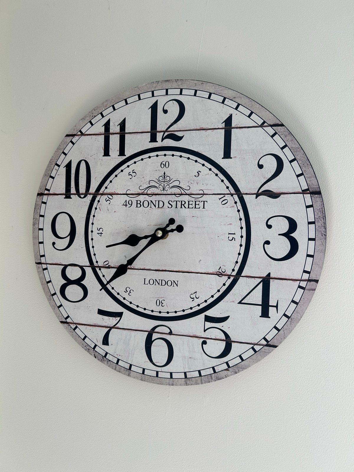 Grote wandklok met 'London' design, Ophalen