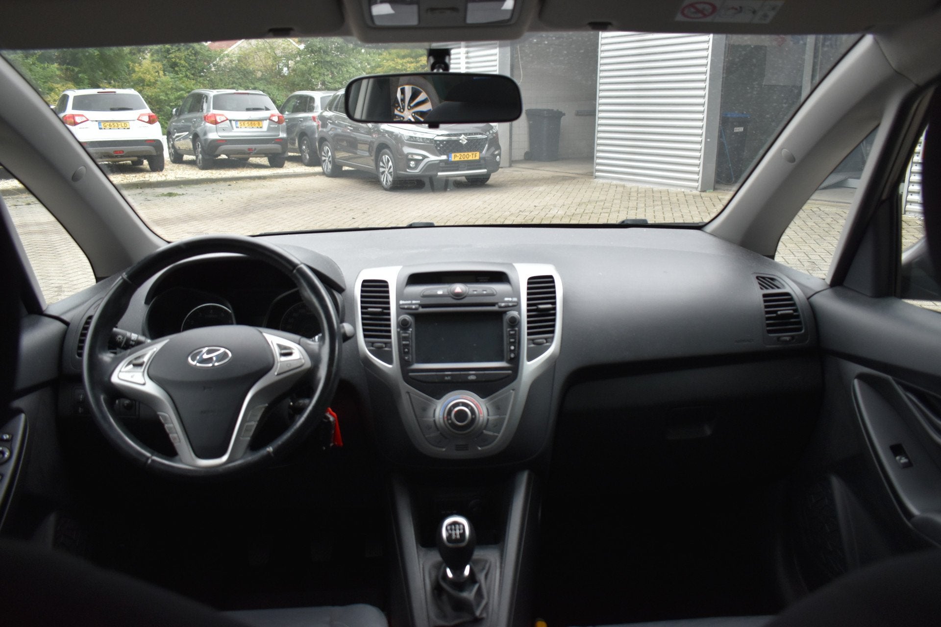 Hyundai ix20 1.4i Go! Handgeschakeld 90pk | Airco | Navigati, Auto's, Stof, Gebruikt, Zwart, 4 cilinders