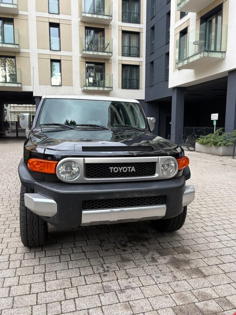Toyota FJ Cruiser 4.0 V6 / 4x4 / airco /Handgeschakel, Auto's, Stof, Zwart, 4000 cc, Zwart