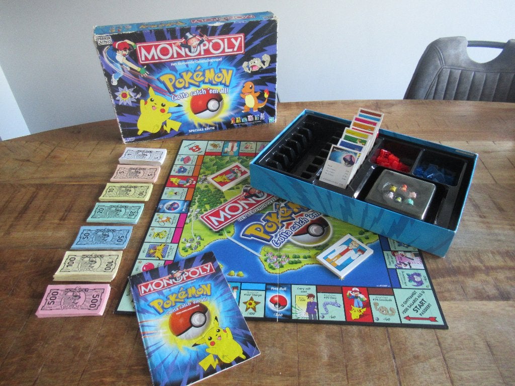 Compleet Monopoly Pokémon speciale editie Gotta catch'em all, Ophalen of Verzenden, Gebruikt