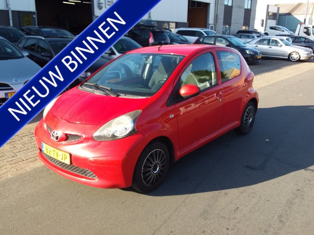 Toyota Aygo 1.0-12V + (bj 2007), Auto's, Voorwielaandrijving, Stof, Gebruikt, Zwart
