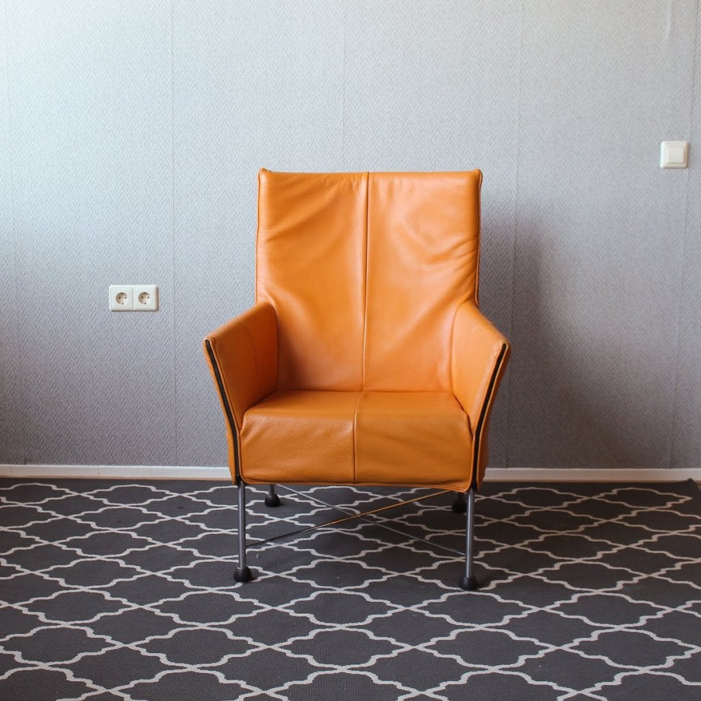 Montis Charly fauteuils; oranje leder - rvs onderstel, Niet ingevuld, Zo goed als nieuw, Niet ingevuld, Niet ingevuld