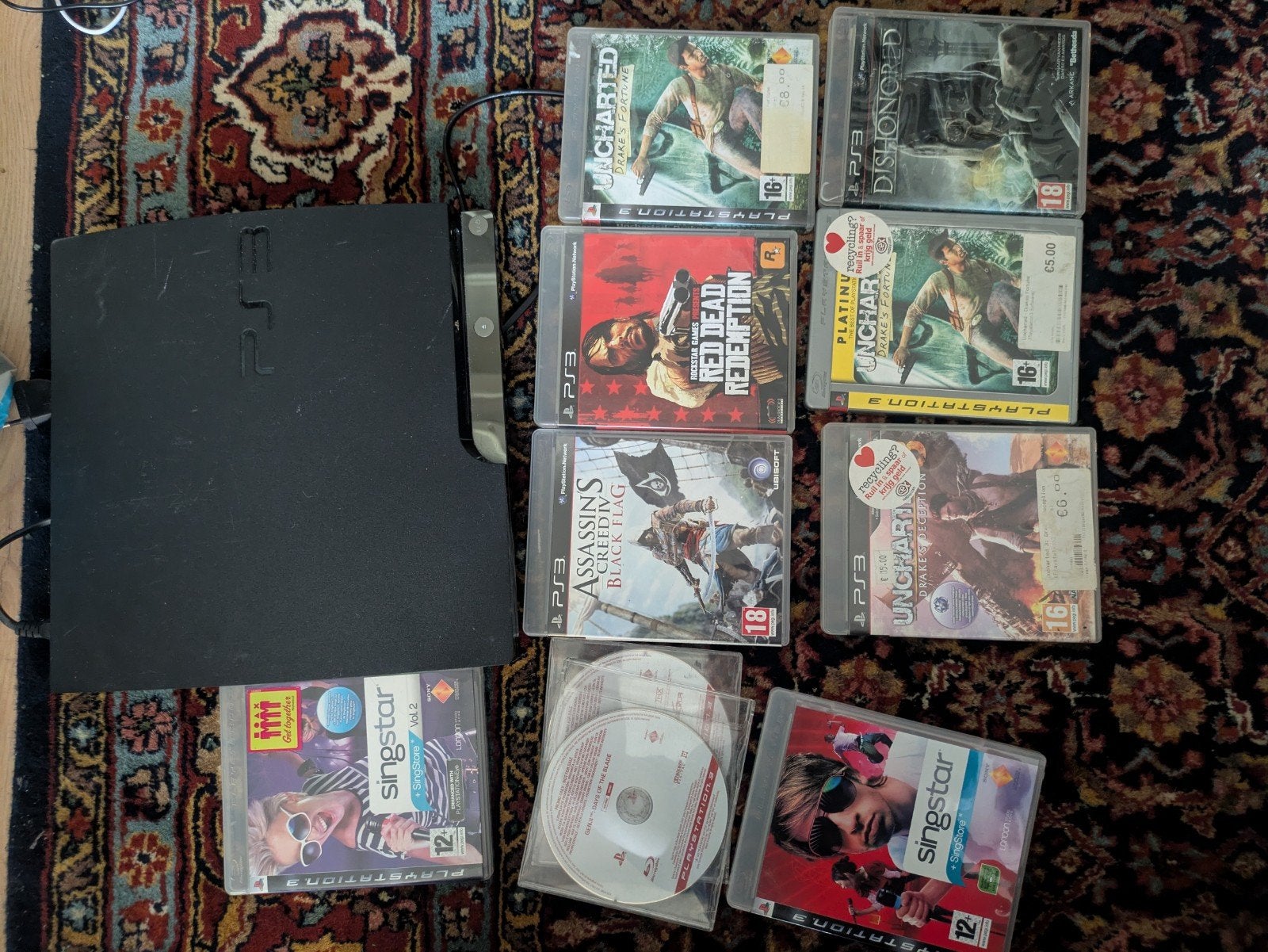 PS3 met 7 games (o.a. Red Dead Redemption, Uncharted), 3 spelers of meer, Ophalen, Gebruikt